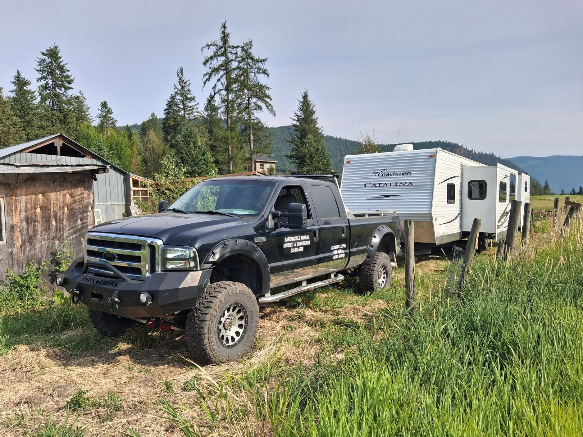Bradley Weston’s truck parked beside a camper trailer it hauled for a local resident.